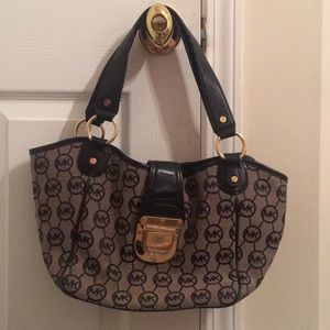 Michael Kota purse